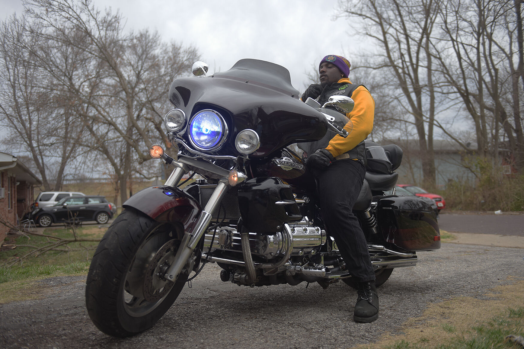 Robert Fountain-Holman shows off his motorcycle